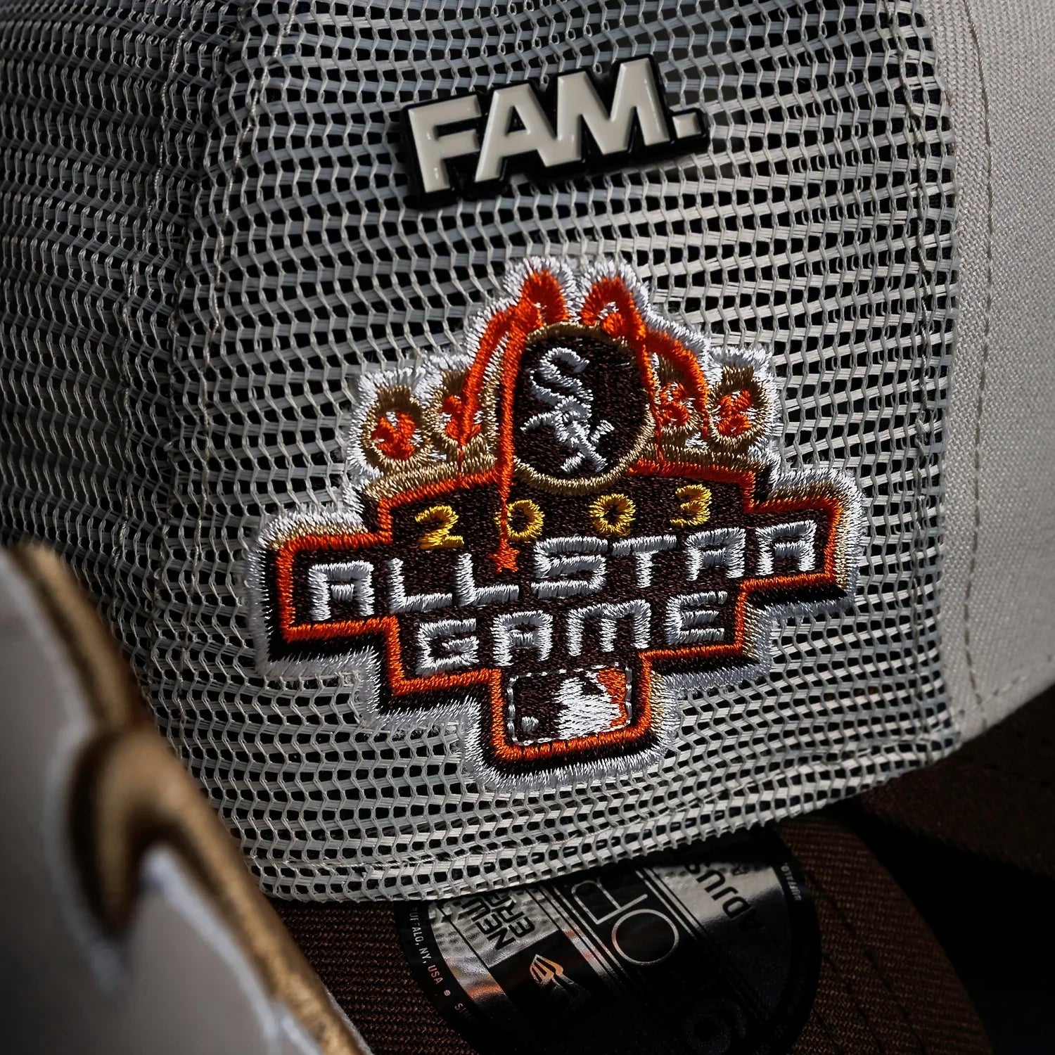 Baseball cap with 'FAM' and '2003 All-Star Game' patch on a mesh back
