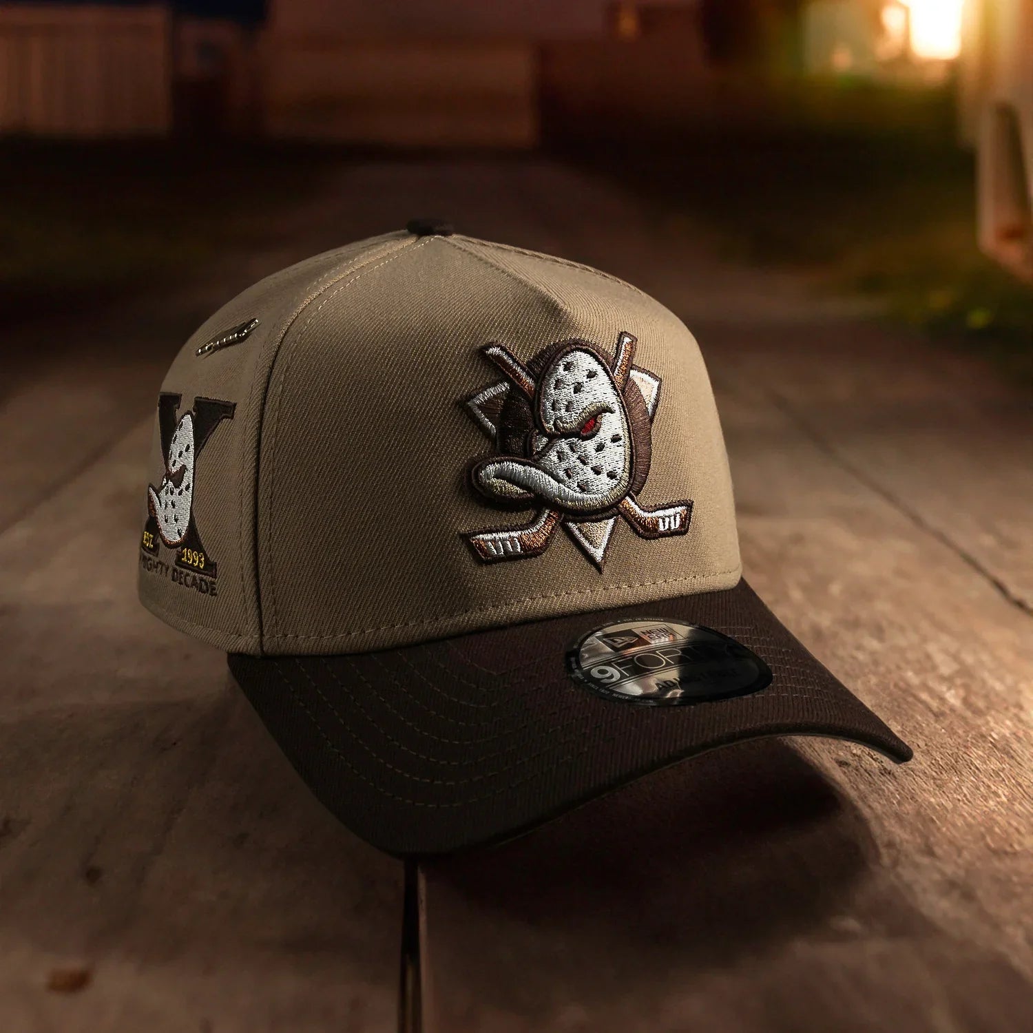 Cap with a unique design on a wooden surface