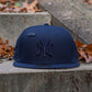 NEW ERA 59FIFTY MLB NEW YORK YANKEES WORLD SERIES 1999 NAVY / GREY UV FITTED CAP
