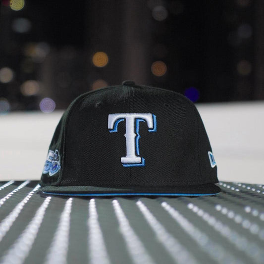 EXCLUSIVE NEW ERA 59FIFTY MLB TEXAS RANGERS 50TH ANNIVERSARY BLACK / BIRDSEYE BLUE UV FITTED CAP